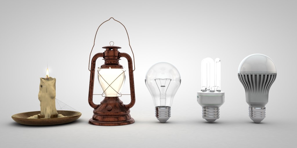 Evolution represented by candle, lantern and different stages of lightbulbs